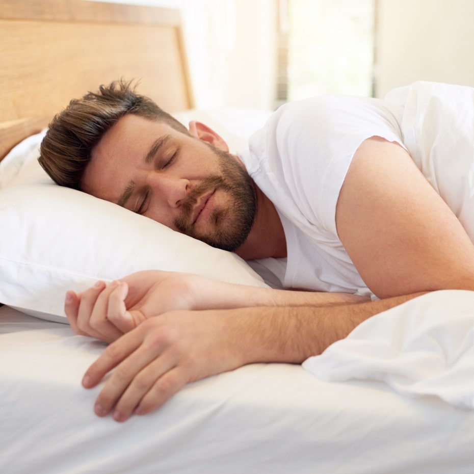 Man resting peacefully thanks to treatment for sleep apnea