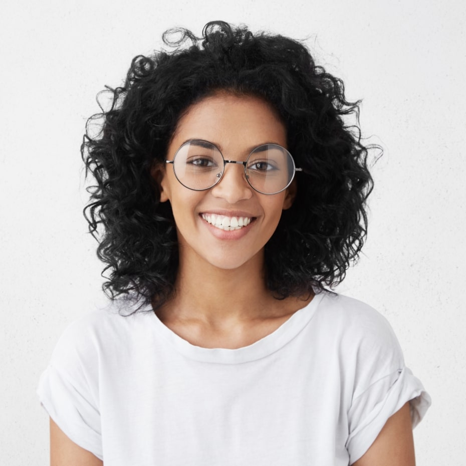 Beautiful young woman excited about TMJ treatment in Des Moines